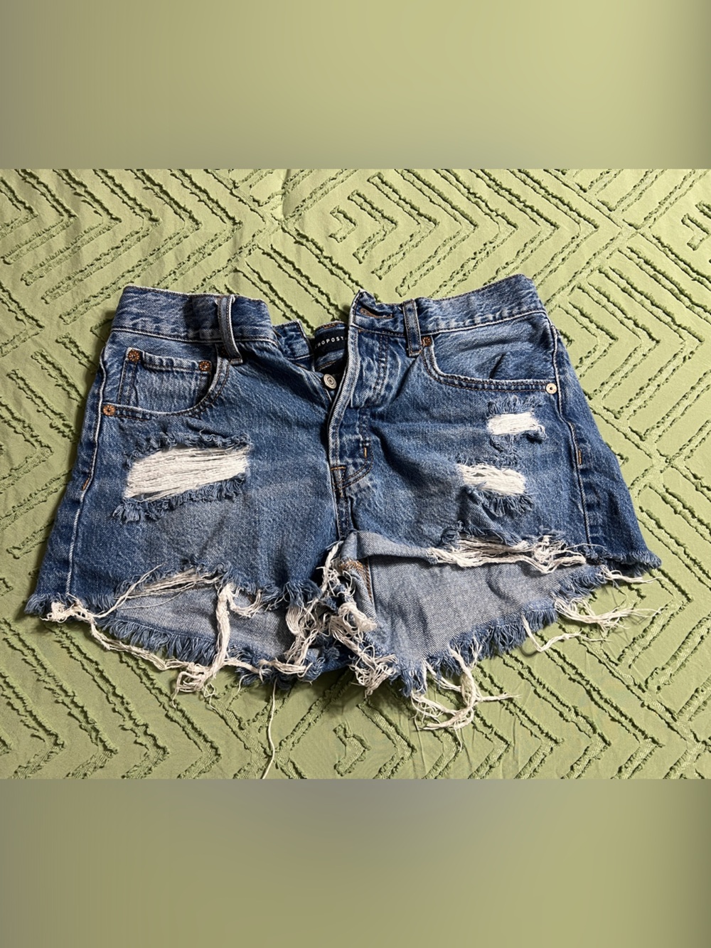 Distressed Blue Denim Cutoff Shorts